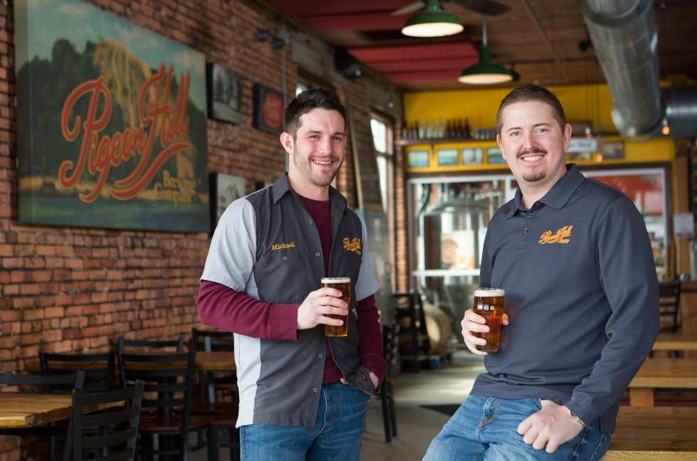 Michael Brower, left, and Joel Kamp enjoy a pint at Pigeon Hill